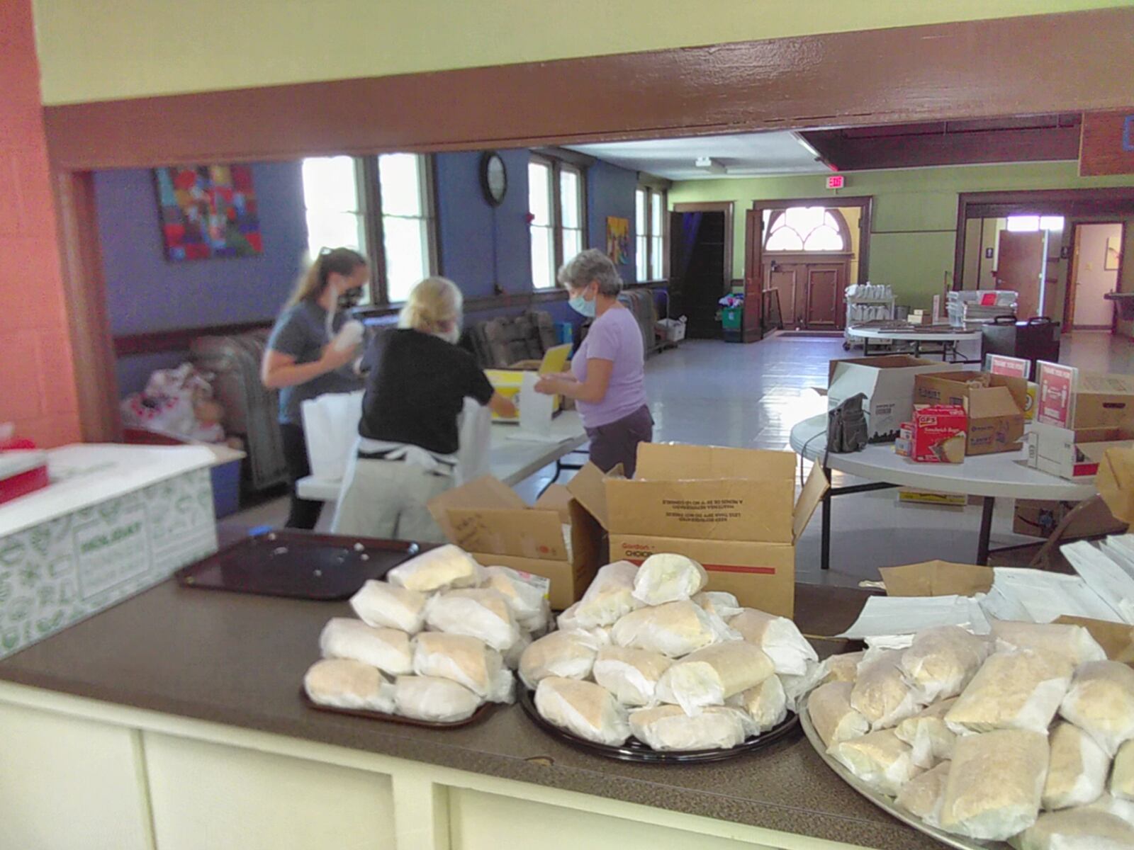 Jeramiah's Letter volunteers help assemble food items for free lunch offered during the week to anyone in need at St. Paul's Lutheran Church - former location of the organization