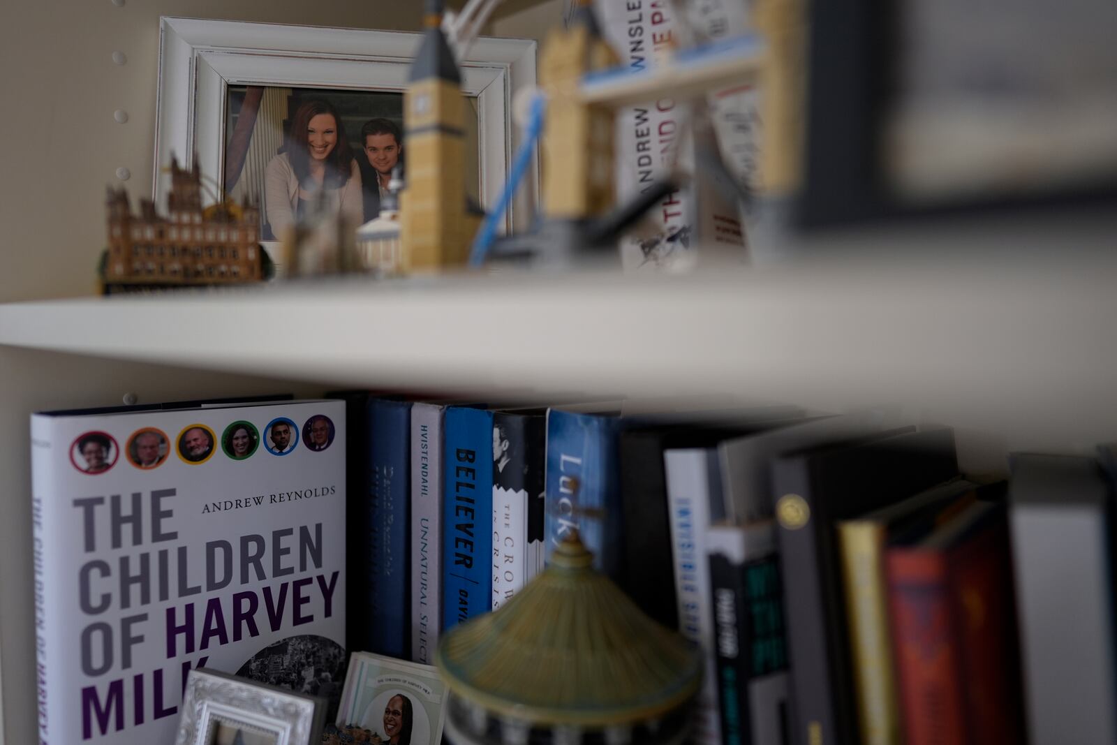 A photo of U.S.-Rep.-elect Sarah McBride, D-Del., with her husband Andy Cray is seen on a shelf in her Wilmington, Del., home, Wednesday, Dec. 18, 2024. Cray died from cancer in 2014. (AP Photo/Carolyn Kaster)