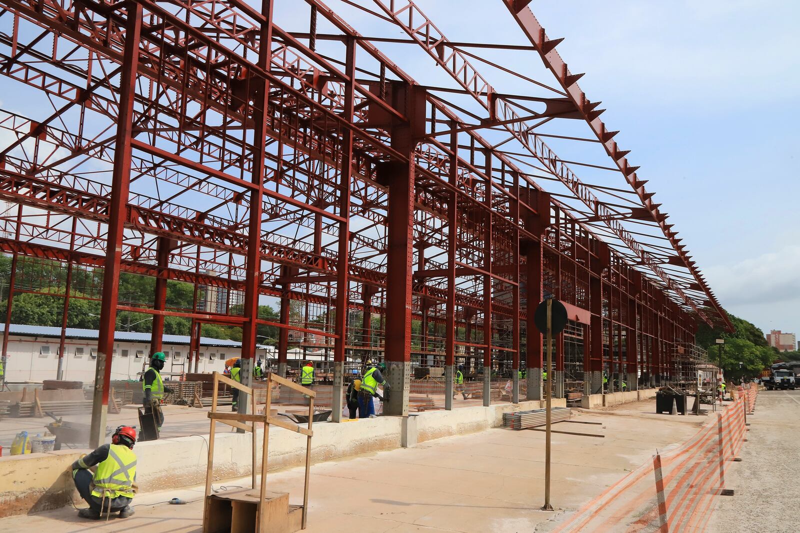 FILE - Construction workers make progress in Belem, Brazil, Sept. 24, 2024, on a project for the COP30 U.N. Climate Summit. (AP Photo/Paulo Santos, File)