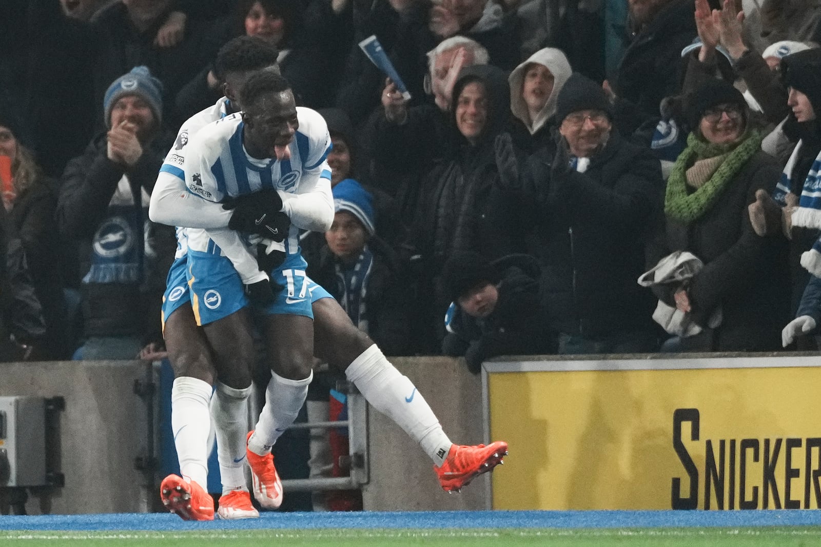 Brighton's Yankuba Minteh reacts after he scored during the English Premier League soccer match between Brighton and Chelsea in Brighton, England, Friday, Feb. 14, 2025. (AP Photo/Dave Shopland)