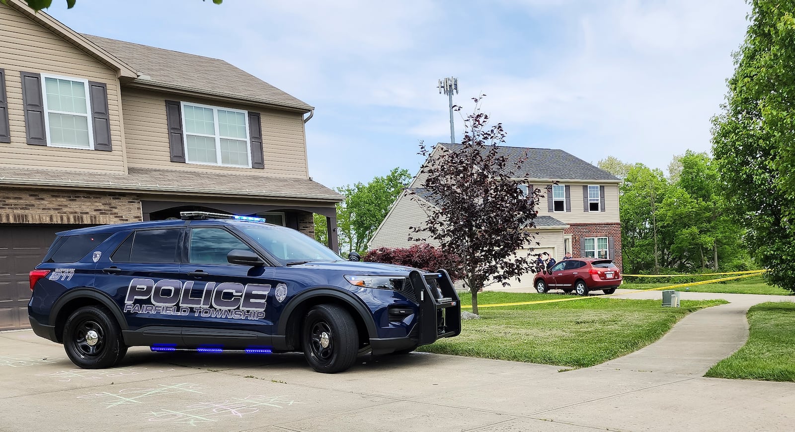 Fairfield Township police and fire crews along with Butler County fire investigation team and State Fire Investigators investigate a fire on Arroyo Ridge Court in Fairfield Township Thursday, May 11, 2023. A woman was transported by medical helicopter with burn injuries. NICK GRAHAM/STAFF