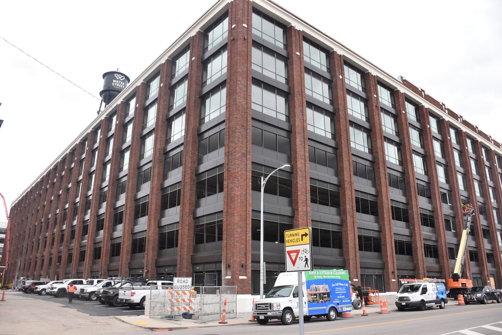 Parts of the Delco building are expected to open around June, including about 30 of its 160 apartments and the 482 public parking spaces. The Delco is a massive, mixed-use development located just south of the Day Air Ballpark, where the Dayton Dragons play baseball in downtown Dayton. CORNELIUS FROLIK / STAFF