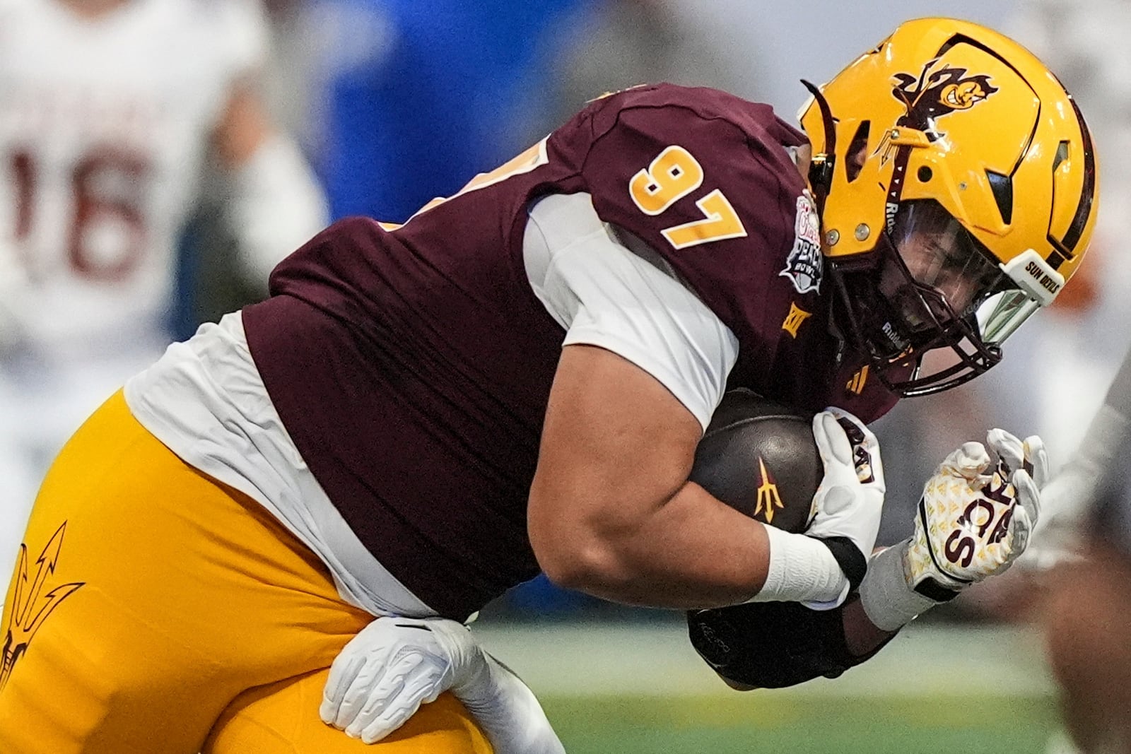 Arizona State defensive lineman Blazen Lono-Wong (97) against Texas during the first half in the quarterfinals of a College Football Playoff, Wednesday, Jan. 1, 2025, in Atlanta. (AP Photo/Brynn Anderson)