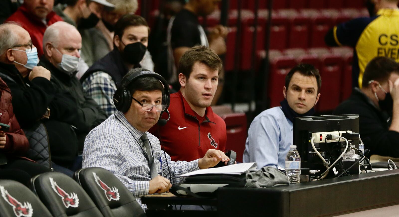 Joe Lunardi, left, calls a game between Dayton and Saint Joseph’s on Saturday, Feb 19, 2022, at Hagan Arena in Philadelphia, Pa. David Jablonski/Staff