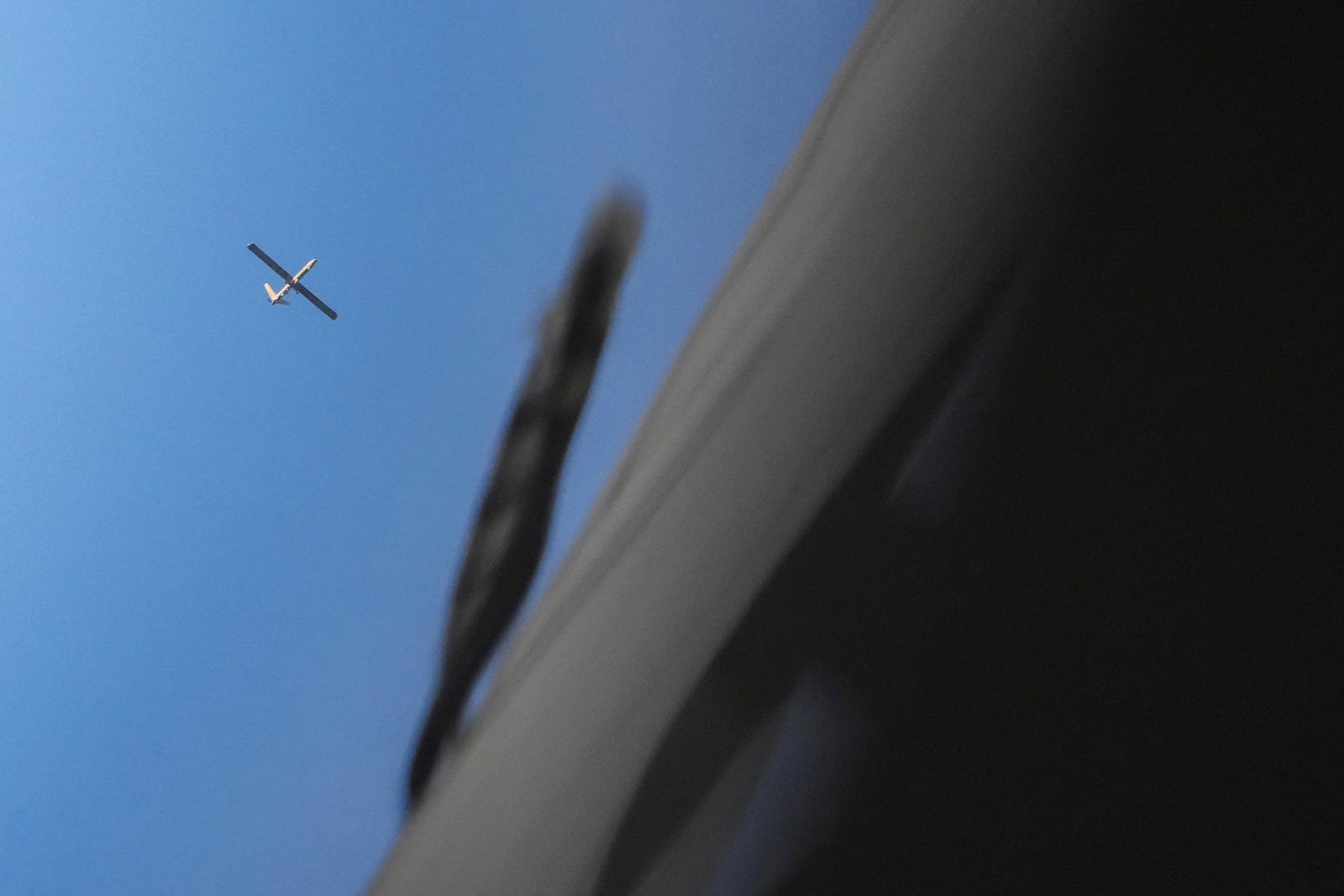 An Israeli drone flies over Beirut, Tuesday, Oct. 29, 2024. (AP Photo/Hassan Ammar)