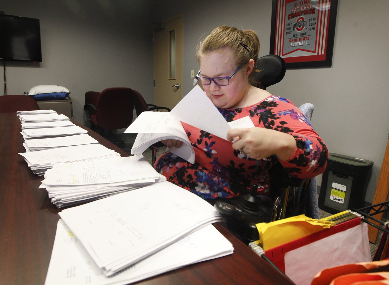 This photo from 2017 shows Theresa Sauter, a Centerville resident who received a number of services funded by the Montgomery County Human Services Levy that helps integrate her into the community, allowing her to live with a degree of independence and gives her employment opportunities. CHRIS STEWART / STAFF