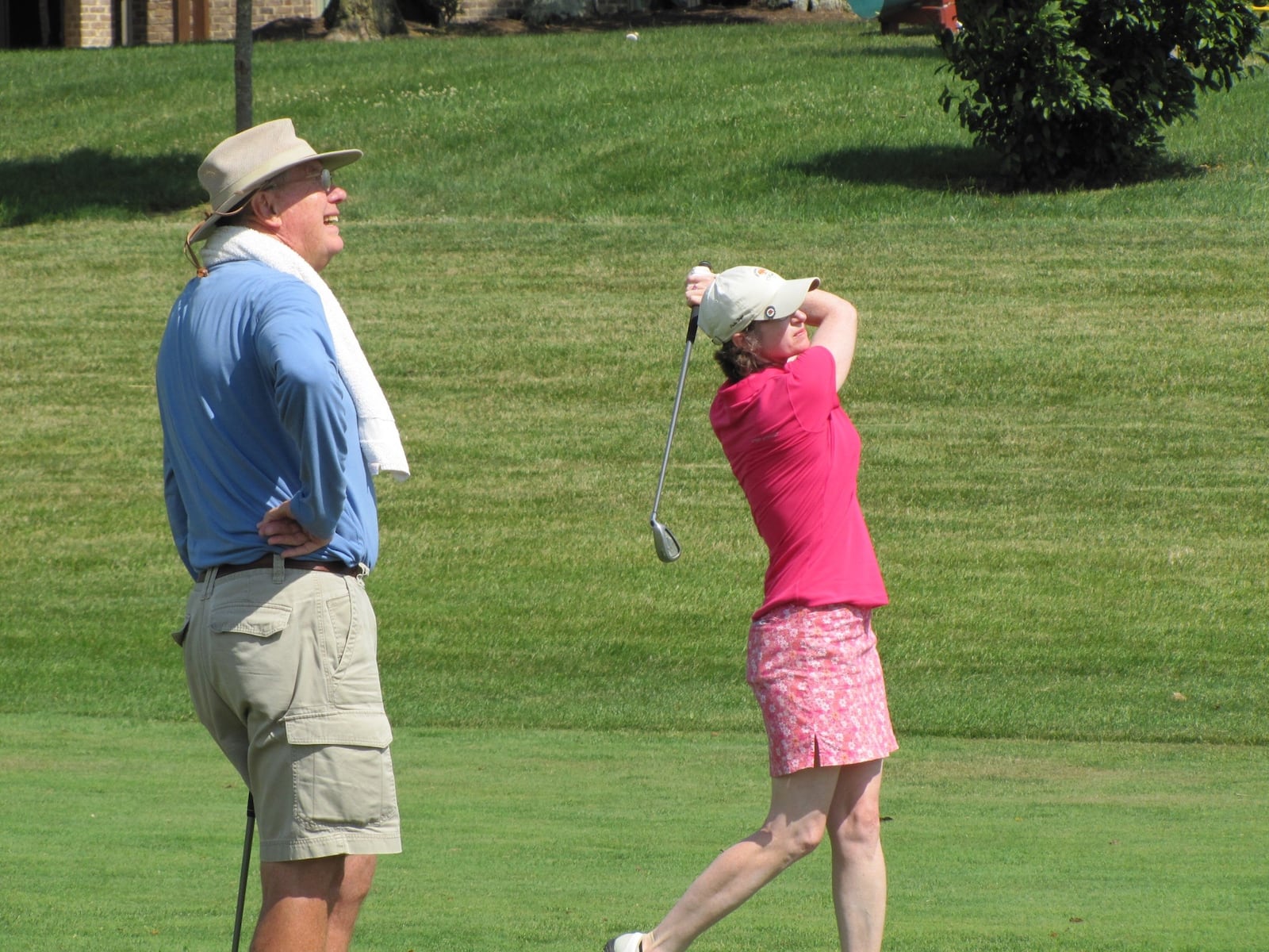 Christine Lindsey and her late father, Jim Ridenour, who would caddy for her at big tournaments. CONTRIBUTED