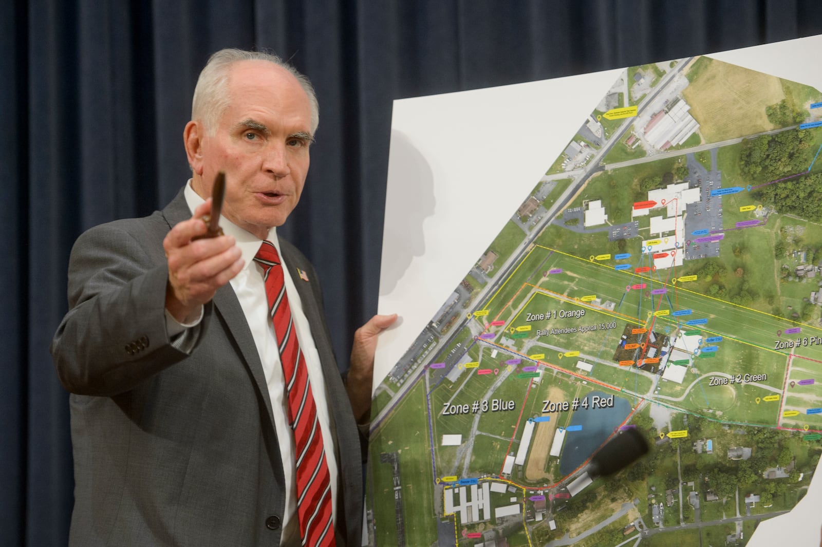 Chairman Rep. Mike Kelly, R-Pa., speaks in front of a site map at the first public hearing of a bipartisan congressional task force investigating the assassination attempts against Donald Trump, at Capitol Hill in Washington, Thursday, Sept. 26, 2024. (AP Photo/Rod Lamkey, Jr.)