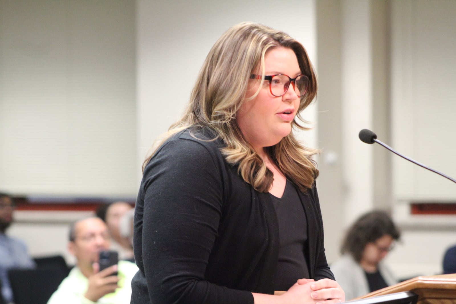 Emma Smales speaks at the Dayton City Commission meeting on Wednesday, March 1, 2023, about her support of source of income protections that the commission approved. CORNELIUS FROLIK / STAFF