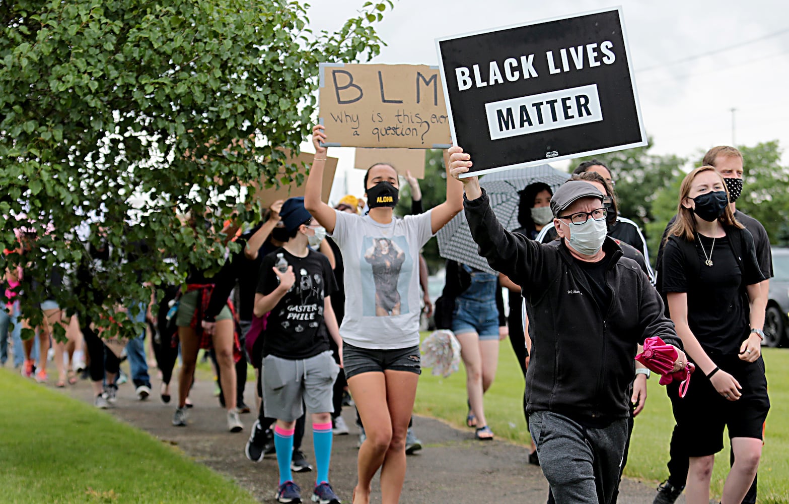 PHOTOS: Demonstrators rally for justice in Beavercreek