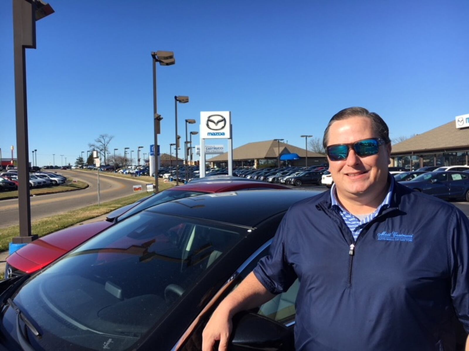 Matt Castrucci has 17 acres on Malls Park Drive for his auto dealerships. A move to 37 acres near Byers and Lyons roads would double his space. THOMAS GNAU/STAFF