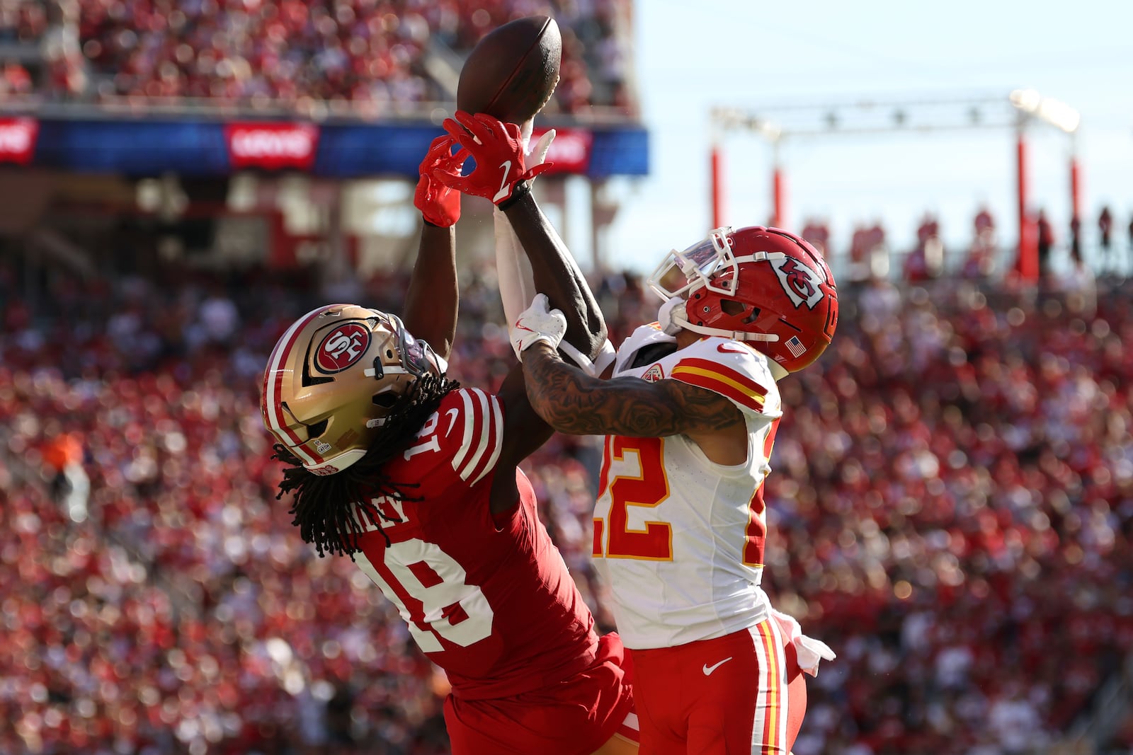 San Francisco 49ers wide receiver Chris Conley (18) cannot catch a pass while being defended by Kansas City Chiefs cornerback Trent McDuffie during the second half of an NFL football game in Santa Clara, Calif., Sunday, Oct. 20, 2024. (AP Photo/Jed Jacobsohn)