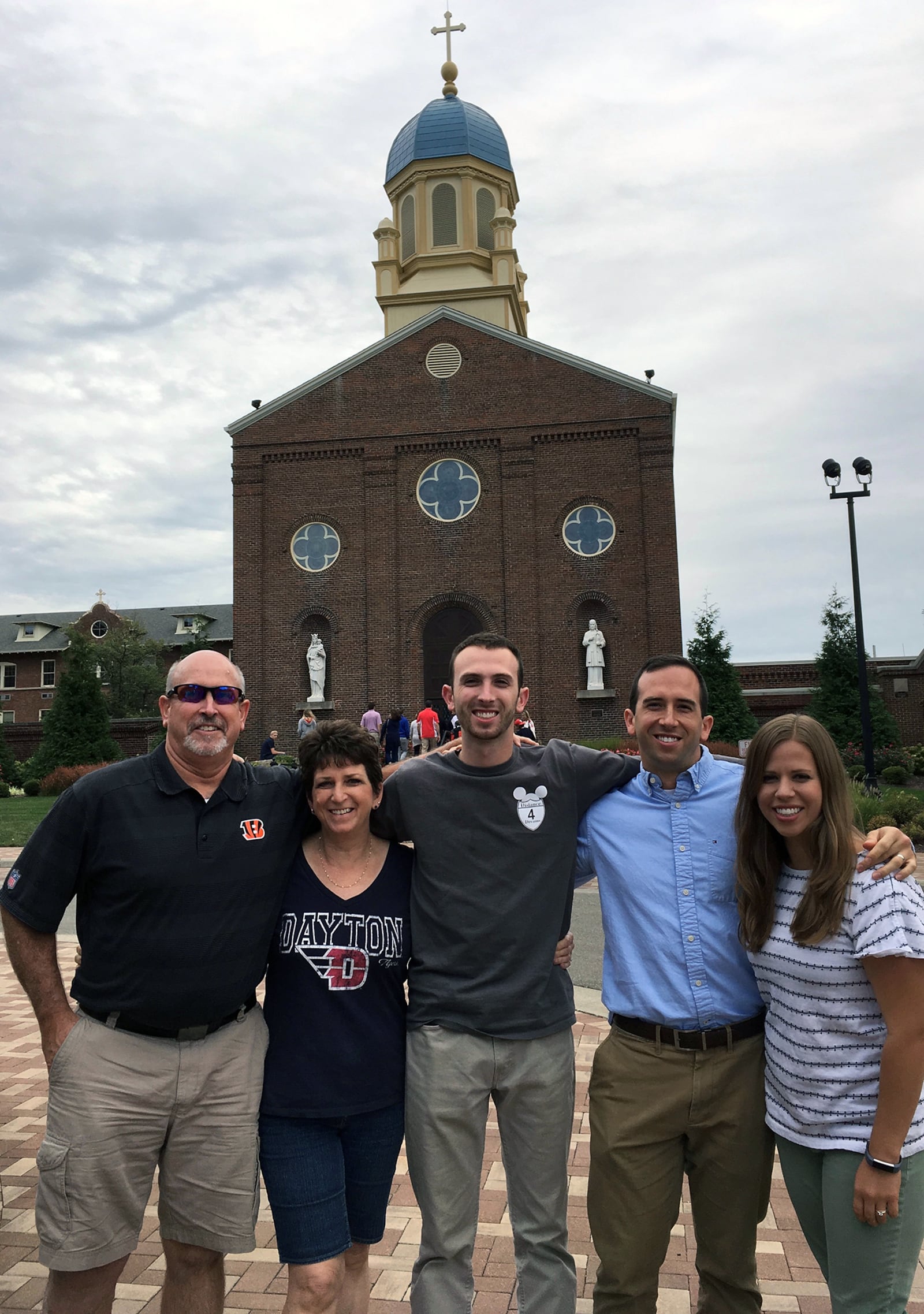 Doran is a University of Dayton graduate and is shown with his family on the campus. L-R wife Coletta whose dad was a long time supporter of UD, youngest son Eric, who received his bachelors degree in engineering in 2019 and his masters in 2020 from UD, older son Marc, who graduated from Ohio State and now runs a laboratory at the UD research institute and Marc's wife, Elizabeth, who received her master's degree from UD in 2023.