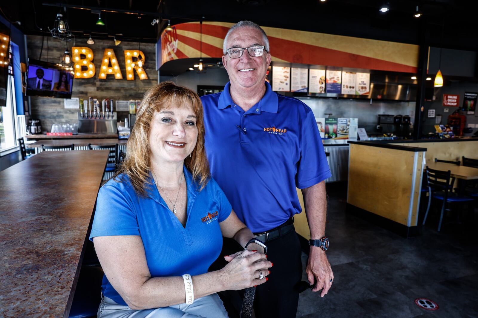 Co-owner of Hot Head Burritos Kelly Gray (left) and founder Ray Wiley in their store at 1113 Brown St. in Dayton. JIM NOELKER/STAFF