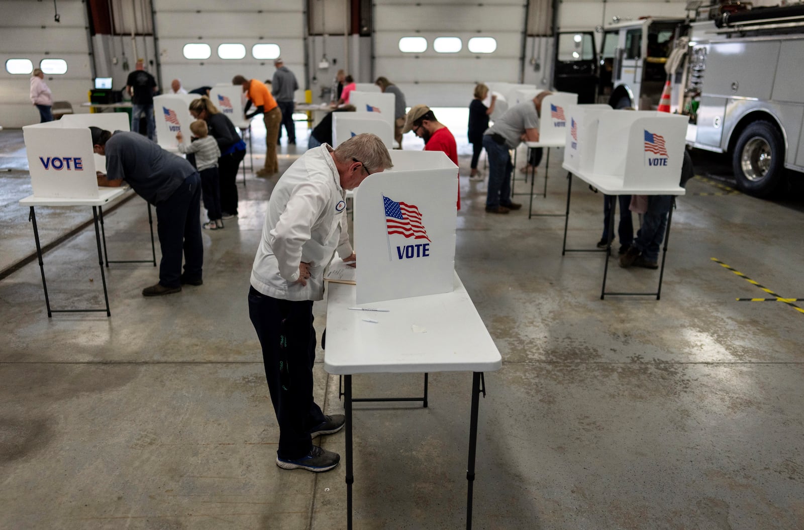 Voters fill out their ballots at the Pleasant Township Fire Department on Election Day, Tuesday, Nov. 5, 2024, in Catawba, Ohio. (AP Photo/Carolyn Kaster)