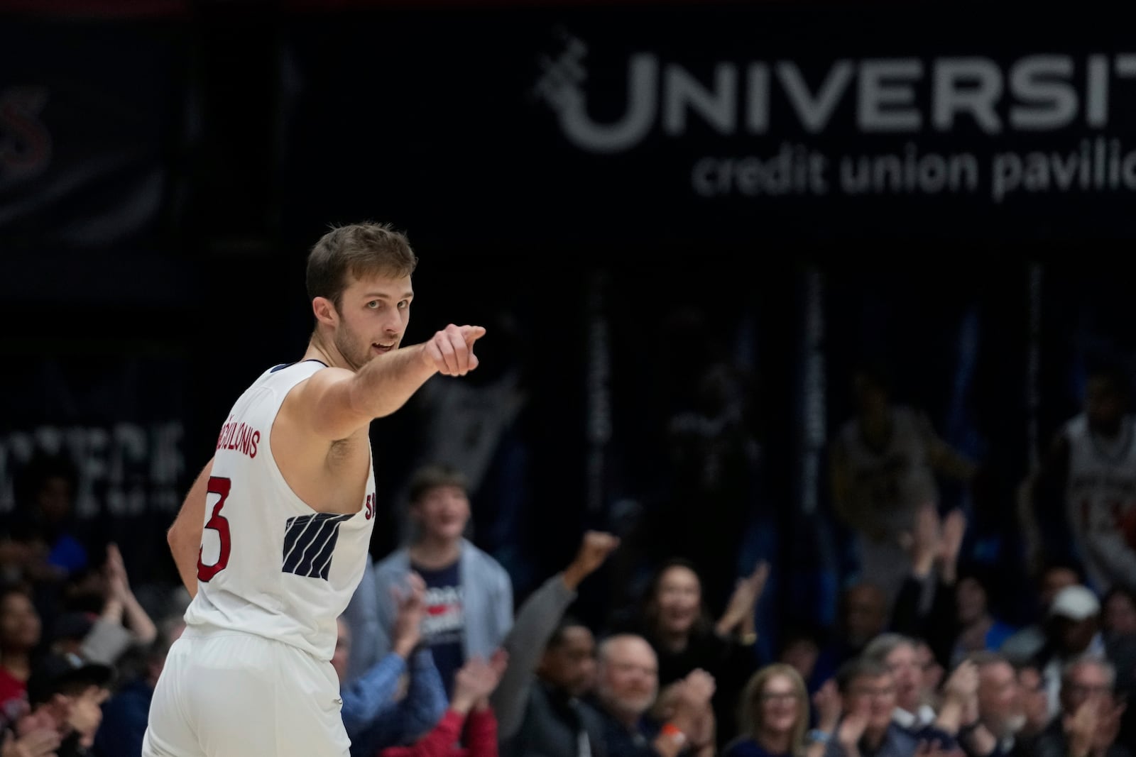 Saint Mary's guard Augustas Marciulionis reacts after making a 3-point basket during the first half of an NCAA college basketball game against Oregon State, Saturday, March 1, 2025, in Moraga, Calif. (AP Photo/Godofredo A. Vásquez)