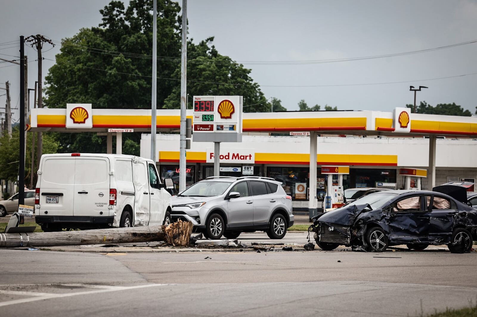 A police pursuit involving a stolen car that fled from police Friday afternoon, June 23, 2023, ended in a three-vehicle injury crash at North Springboro Pike and South Dixie Avenue in Moraine. JIM NOELKER/STAFF