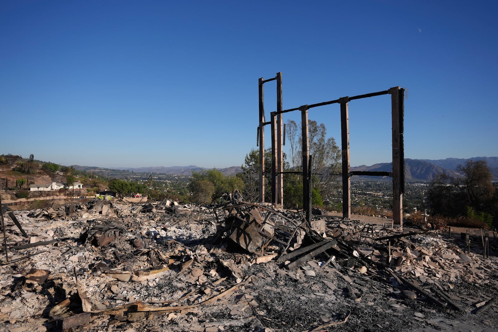 Partial remains of a home destroyed by the Mountain Fire remains standing in Camarillo, Calif., Friday, Nov. 8, 2024. (AP Photo/Jae C. Hong)