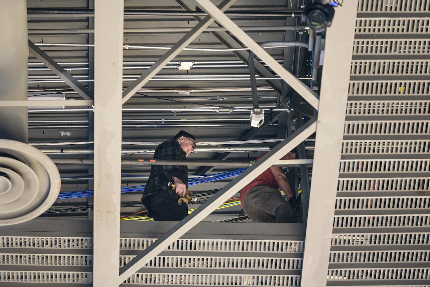 PHOTOS: NCAA First Four basketball court installation at UD Arena