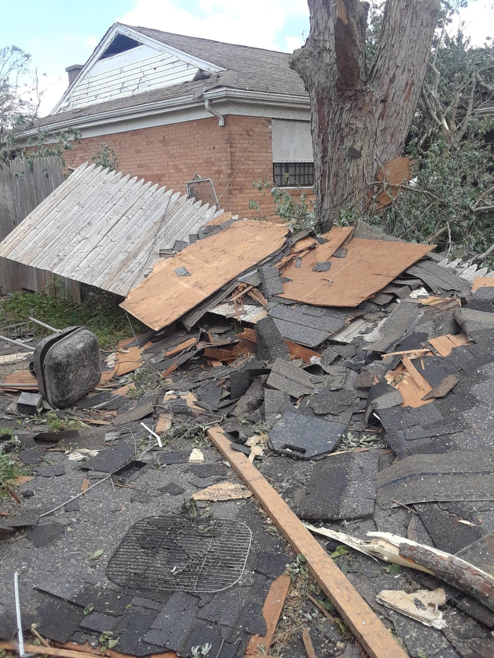 Much of the debris the Memorial Day tornadoes left of Angel Christmon’s home has since been removed, but many signs of that terrible night remain. AMELIA ROBINSON/STAFF