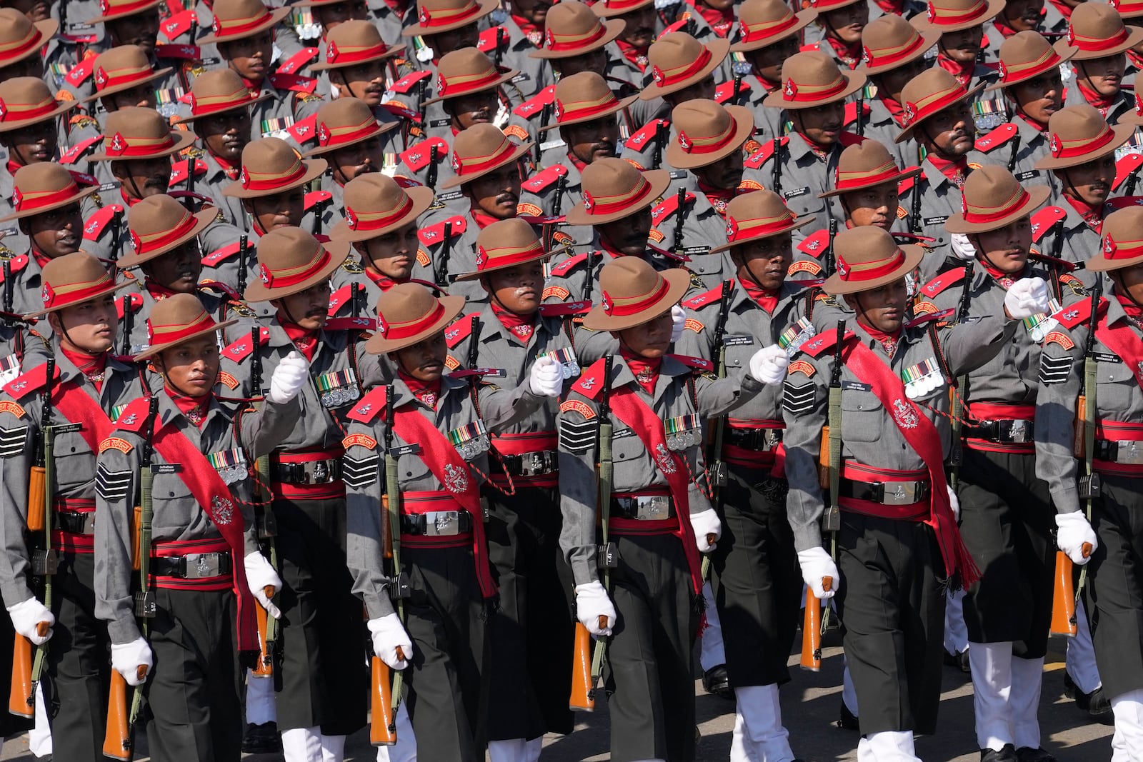 Indian defense forces march through the ceremonial Kartavya Path boulevard during India's Republic Day parade celebrations in New Delhi, India, Sunday, Jan. 26, 2025. (AP Photo/Channi Anand)