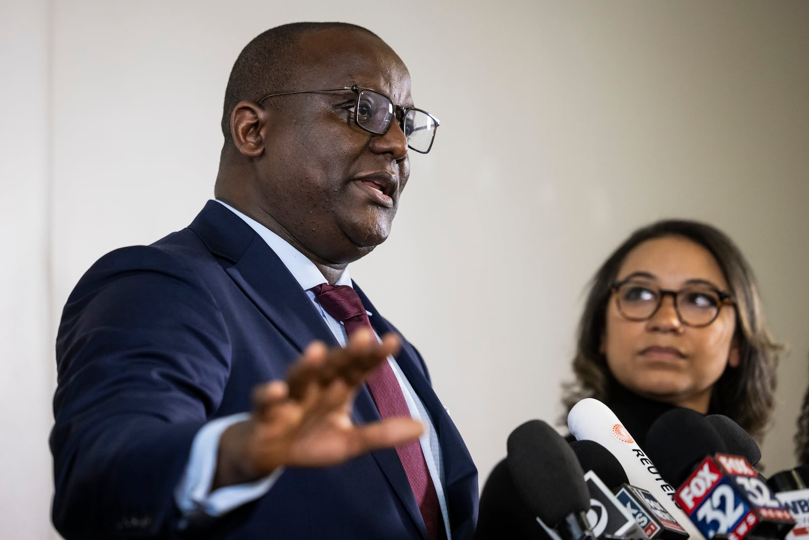 Jussie Smollett's lead defense attorney Nenye Uche speaks to reporters during a news conference Thursday, Nov. 21, 2024, In Chicago, after the Illinois Supreme Court overturned Smollett's conviction on charges of staging a racist and homophobic attack against himself in 2019 and lying to Chicago police. (Ashlee Rezin/Chicago Sun-Times via AP)