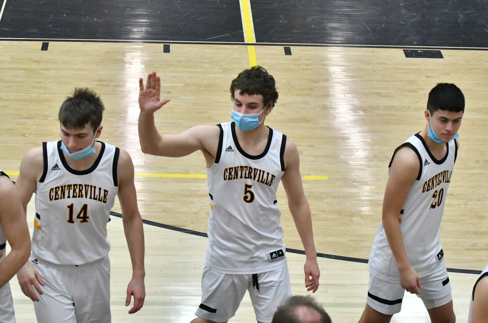 Centerville seniors Reese Clark (14), Max Knauer (5) and Andy Velasco have provided key support -- and entertainment -- for the Elks this seeason. Greg Billing/Contributed