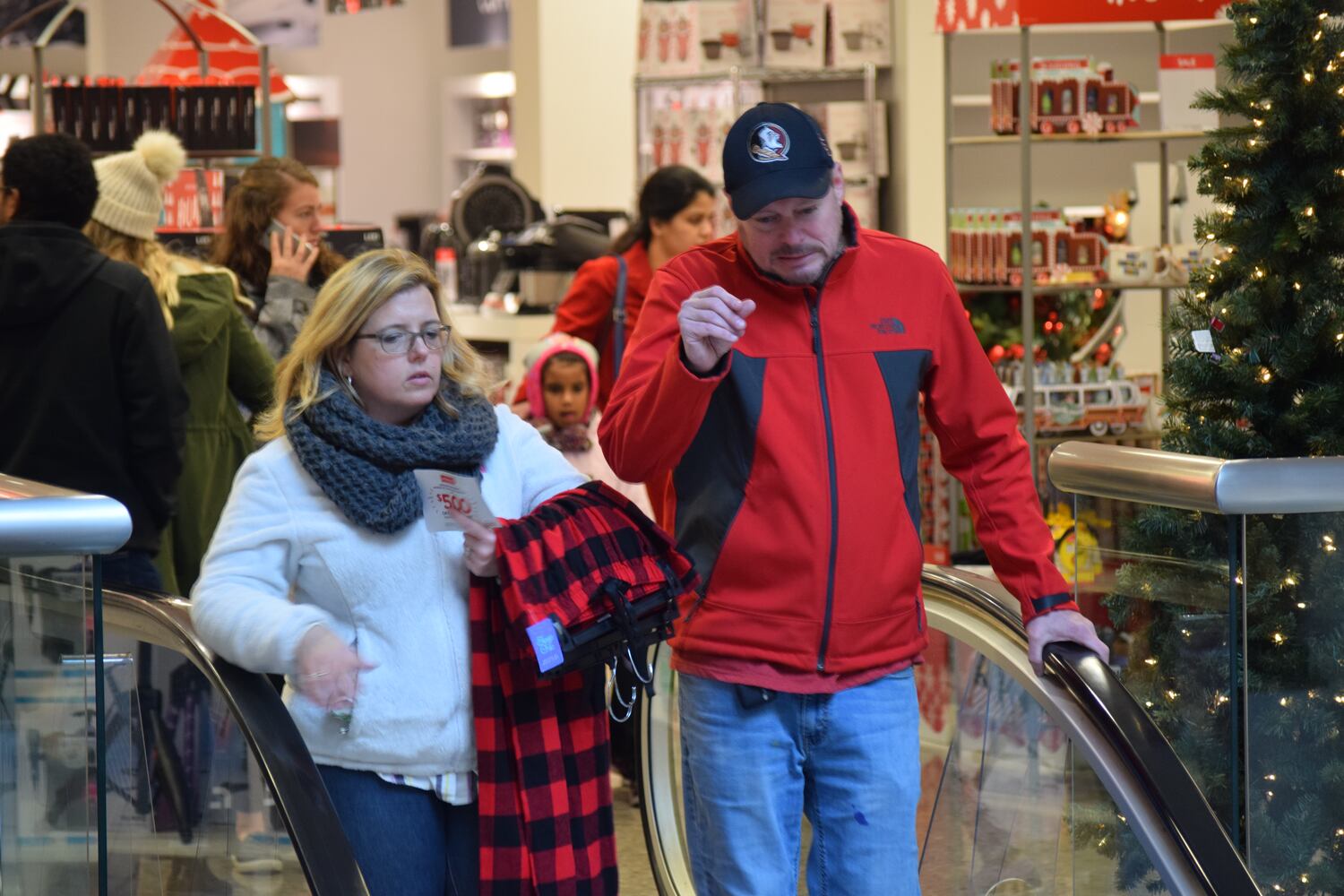 PHOTOS: Hundreds like up outside JCPenney for doorbusters, coupons