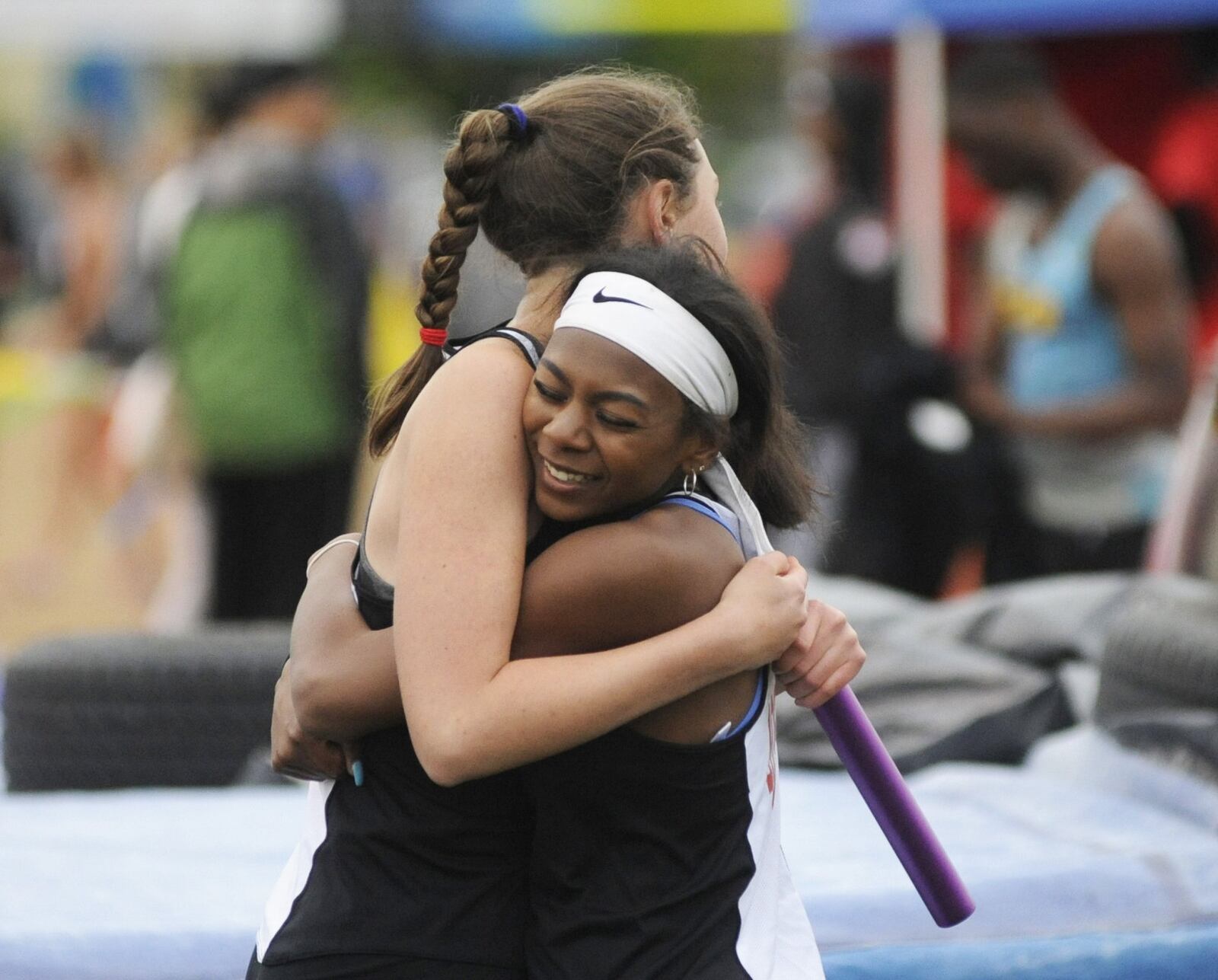 Members of the West Carrollton girls 800-meter relay hug it out after being disqualified during the GWOC track and field meet at Troy’s Memorial Stadium on Friday, May 10, 2019. MARC PENDLETON / STAFF