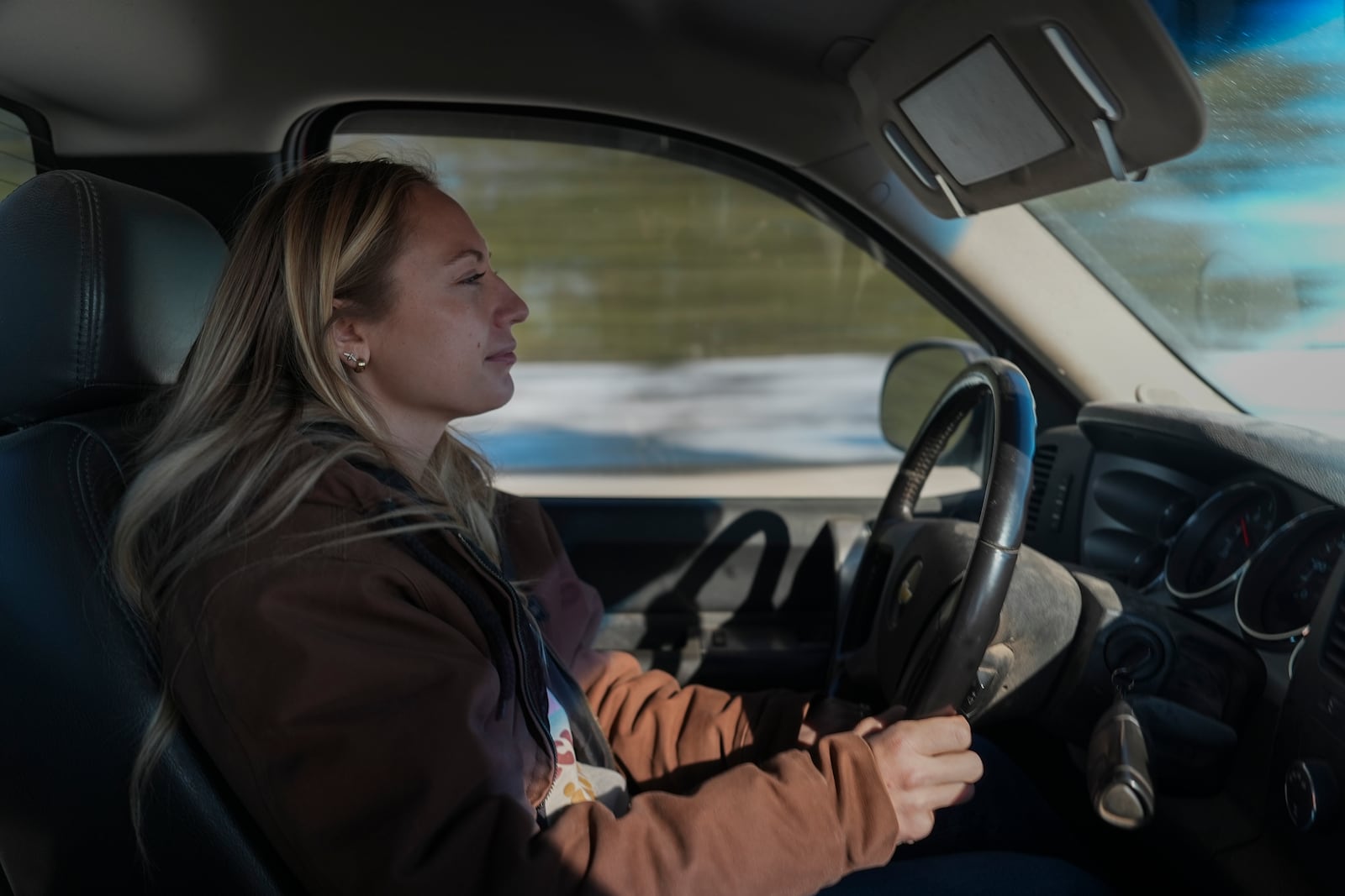 Zoe Kent drives back to her farm, Monday, Jan. 20, 2025, in Bucyrus, Ohio. (AP Photo/Joshua A. Bickel)