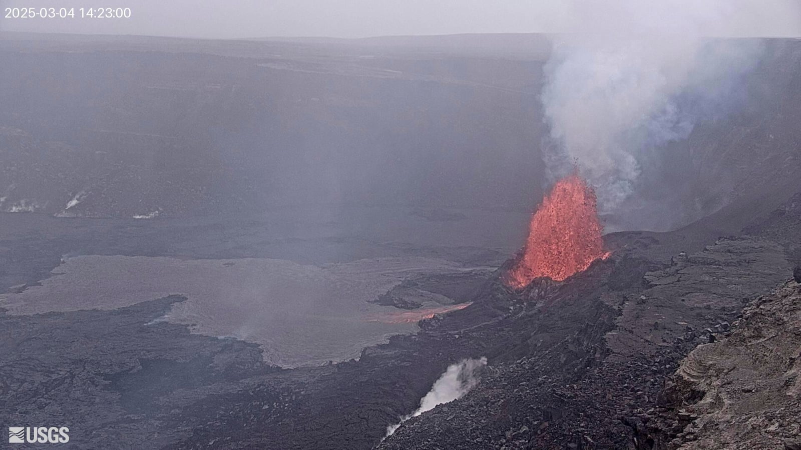 In this webcam photo provided by the U.S. Geological Survey, a fountain of lava shoots up from the latest episode of an ongoing eruption of Kilauea volcano inside Hawaii Volcanoes National Park on Tuesday, March 4, 2025, in Hawaii. (U.S. Geological Survey via AP)