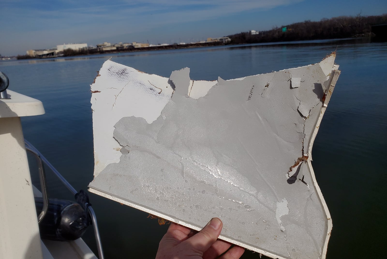 This image provided by Dean Naujoks shows debris recovered from the Potomac River south of Ronald Reagan Washington National Airport in Alexandria, Va., Thursday, Jan. 30, 2025. (Dean Naujoks via AP)