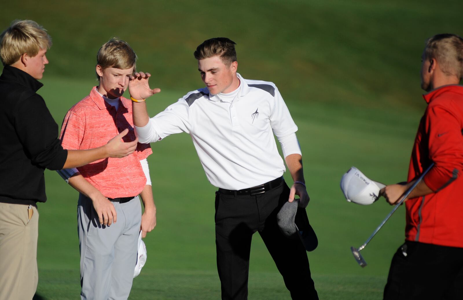 Alex Hewitt (left, Sycamore), Tyler Goecke (Carroll), Austin Greaser (Butler) and Holden Scribner (Troy) all played an extra state-qualifying playoff hole during the D-I district golf tournament at Beavercreek Golf Course on Thursday, Oct. 11, 2018. MARC PENDLETON / STAFF