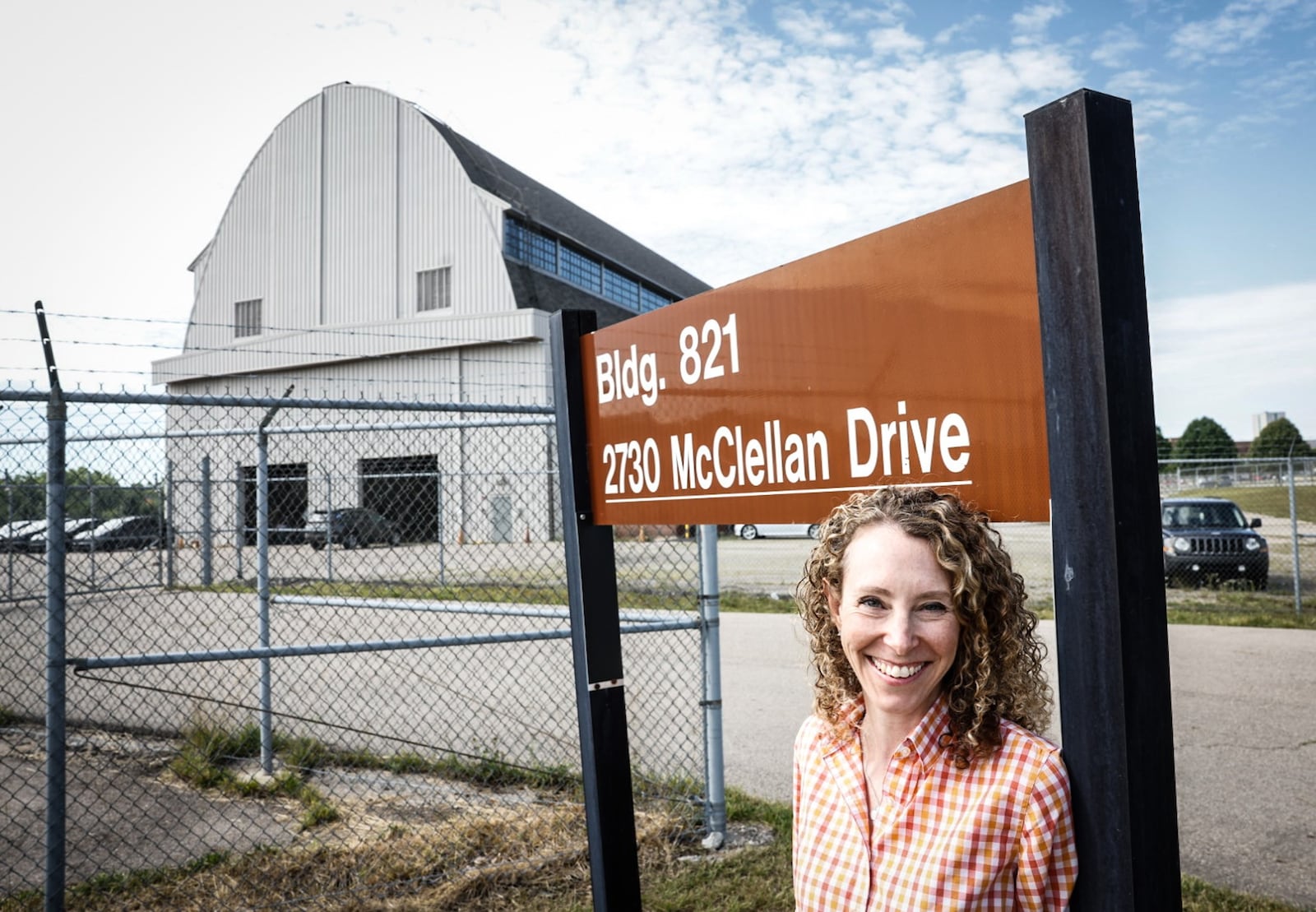 Rachel Butt is the president of Butt Construction her grandfather built the Radar Building, the building in the background, on the Wright Patt Air Force Base. JIM NOELKER/STAFF