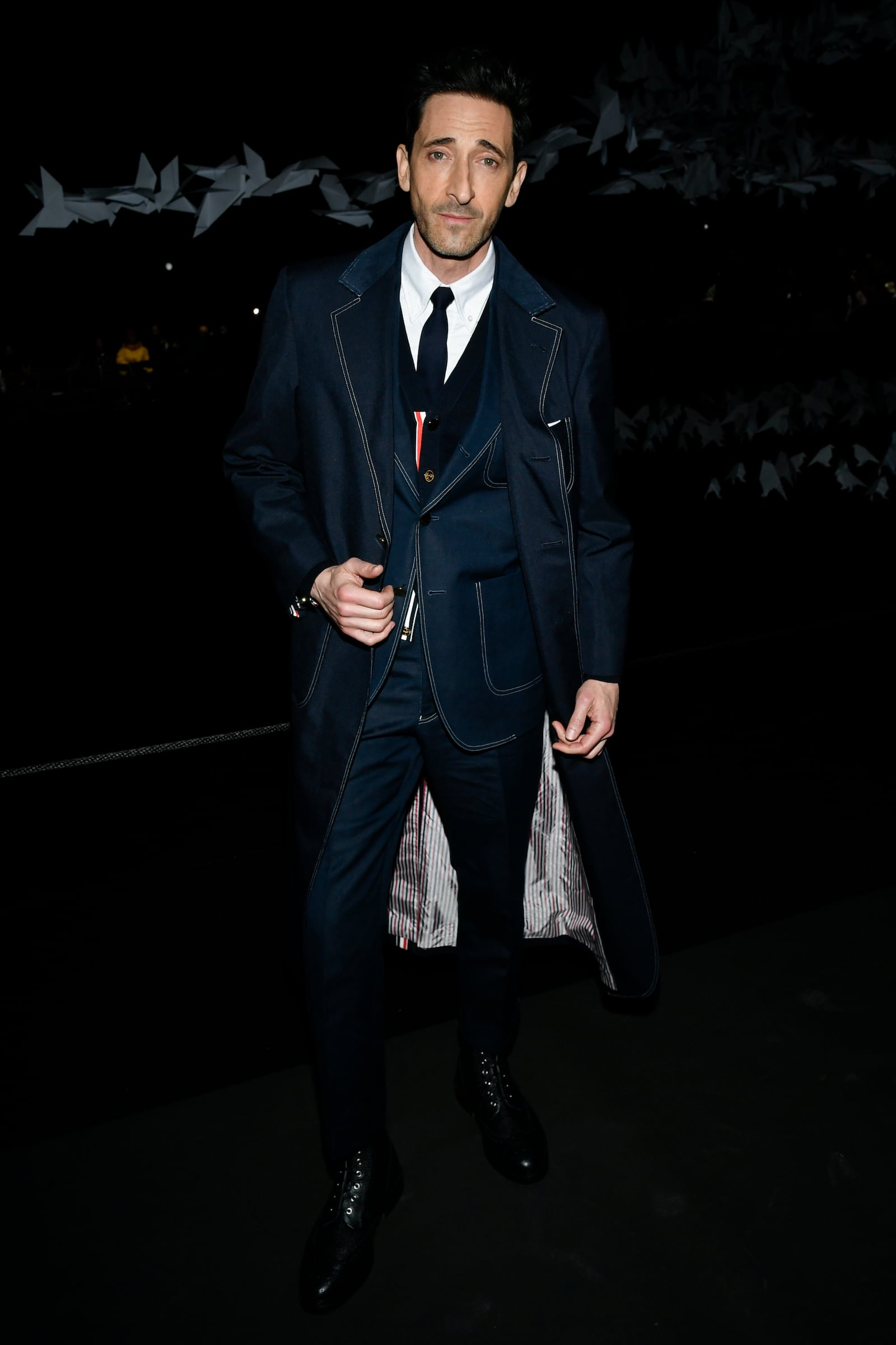 Adrien Brody attends the Thom Browne Fall/Winter 2025 fashion show as part of New York Fashion Week on Tuesday, Feb. 11, 2025, at The Shed in New York. (Photo by Evan Agostini/Invision/AP)