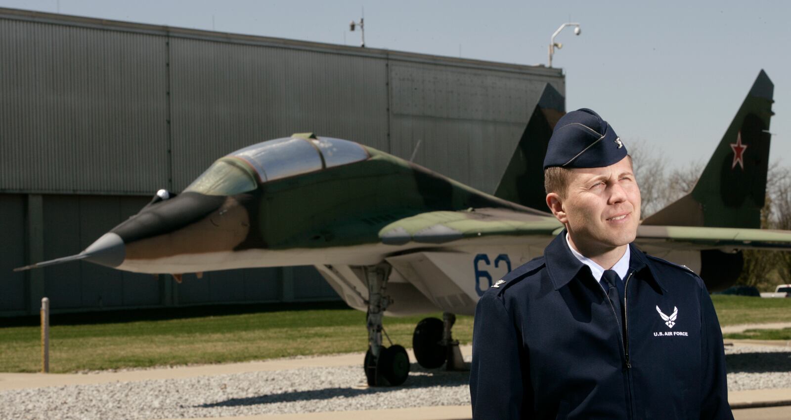 04-14-05 -- Col. Joseph J. Pridotkas, Commander, National Air and space Intelligence Center, with a MiG-29 that is the only visual reference to the building on Wright-Patterson Air Force Base where the Air Force studies information on foreign aerospace threats. Ty Greenlees/DDN