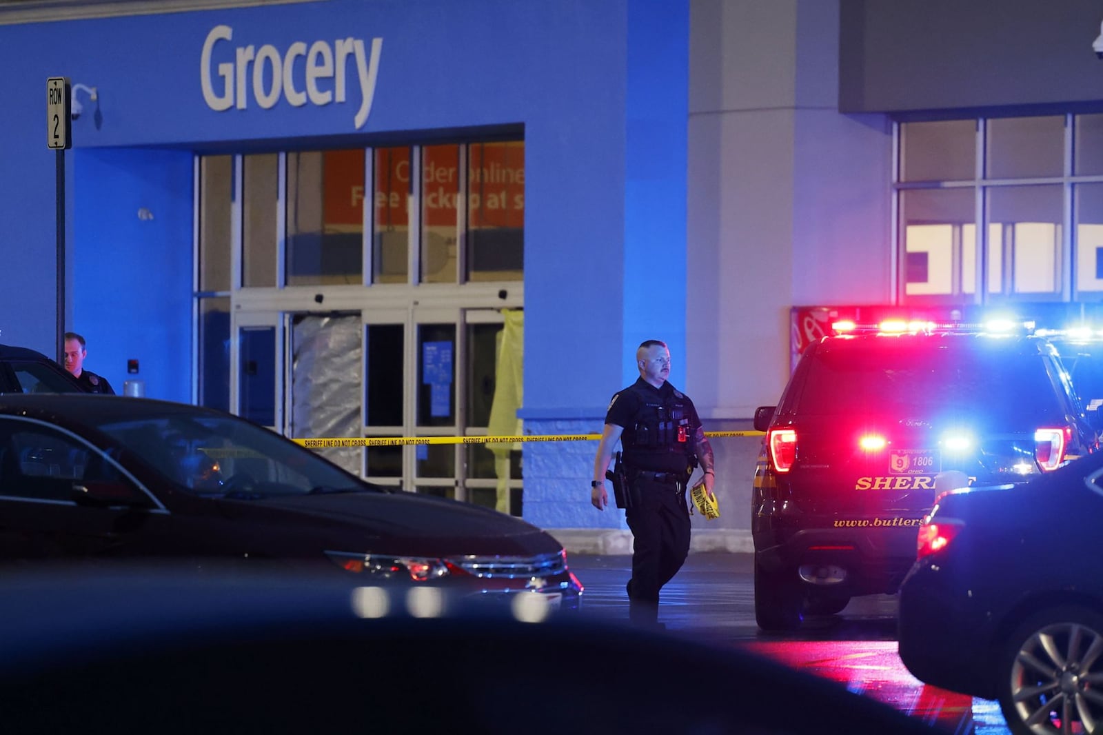 Police investigate a fatal shooting at Walmart on Princeton Road in Fairfield Township Thursday, May 26, 2022. NICK GRAHAM/STAFF