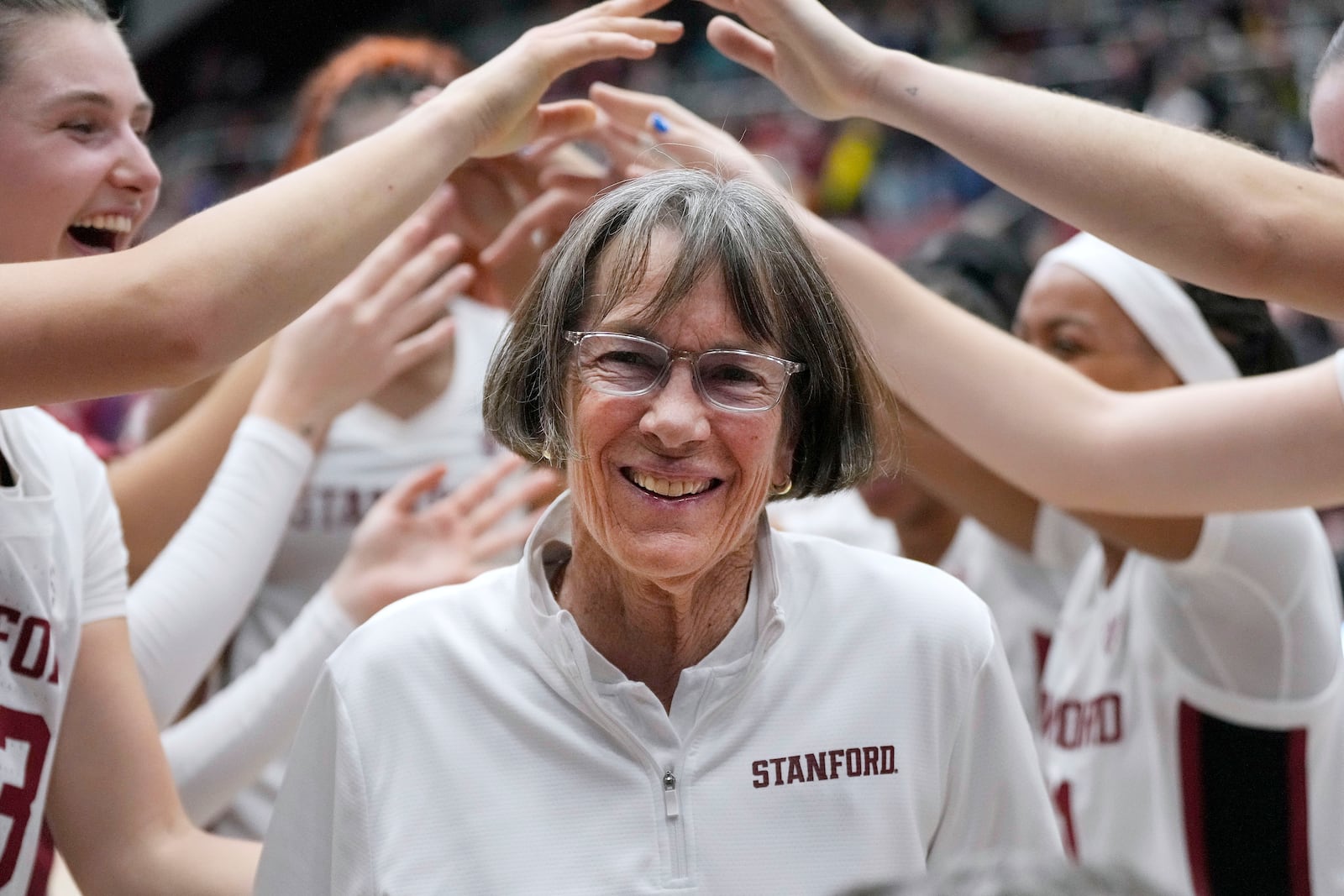 FILE - Stanford coach Tara VanDerveer smiles as players celebrate her 1,202nd victory as a college coach following an NCAA basketball game against Oregon, Friday, Jan. 19, 2024, in Stanford, Calif. (AP Photo/Tony Avelar, File)