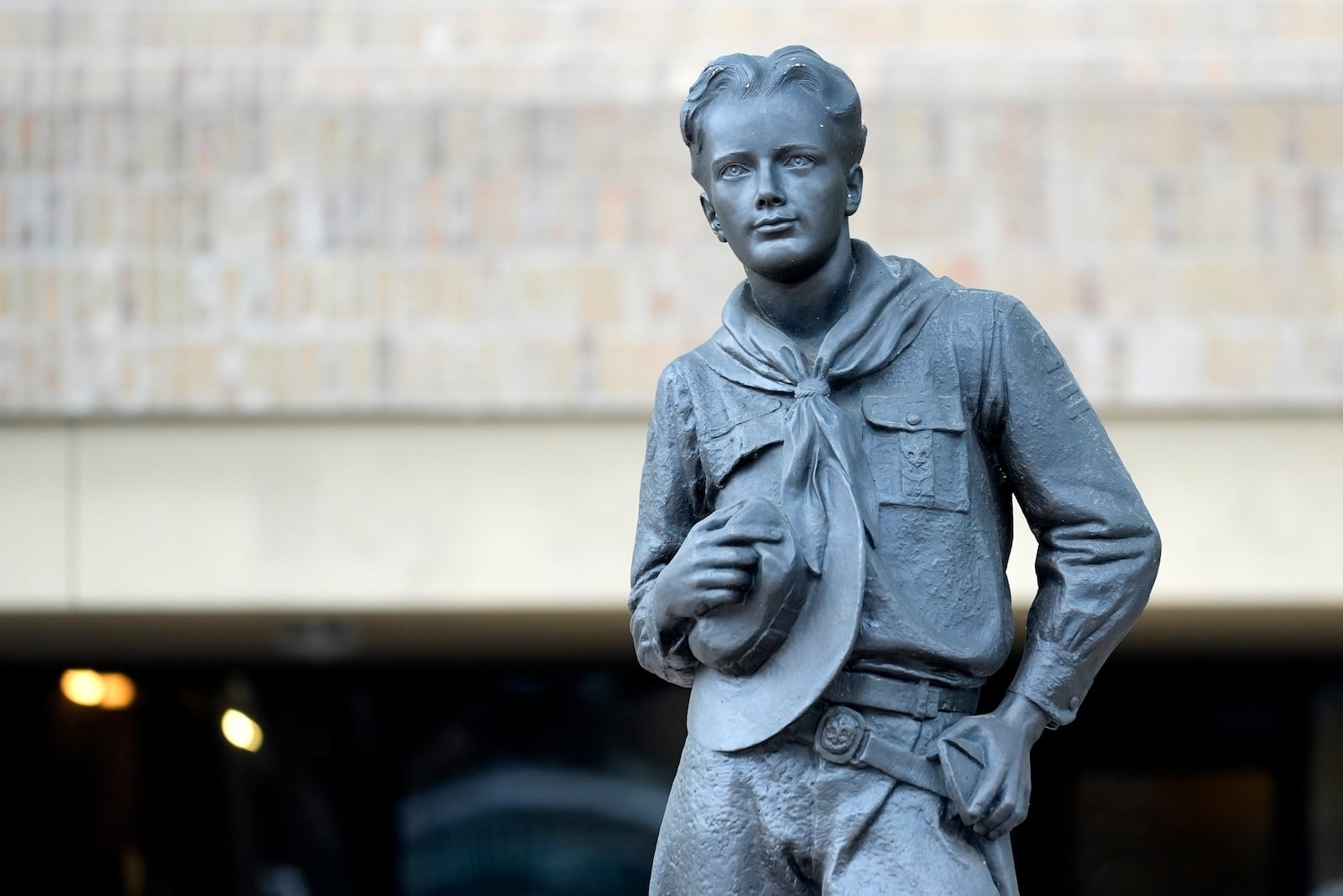 A bronze statue sits outside the Scouting America headquarters in Irving, Texas, Wednesday, Feb. 5, 2025. (AP Photo/LM Otero)