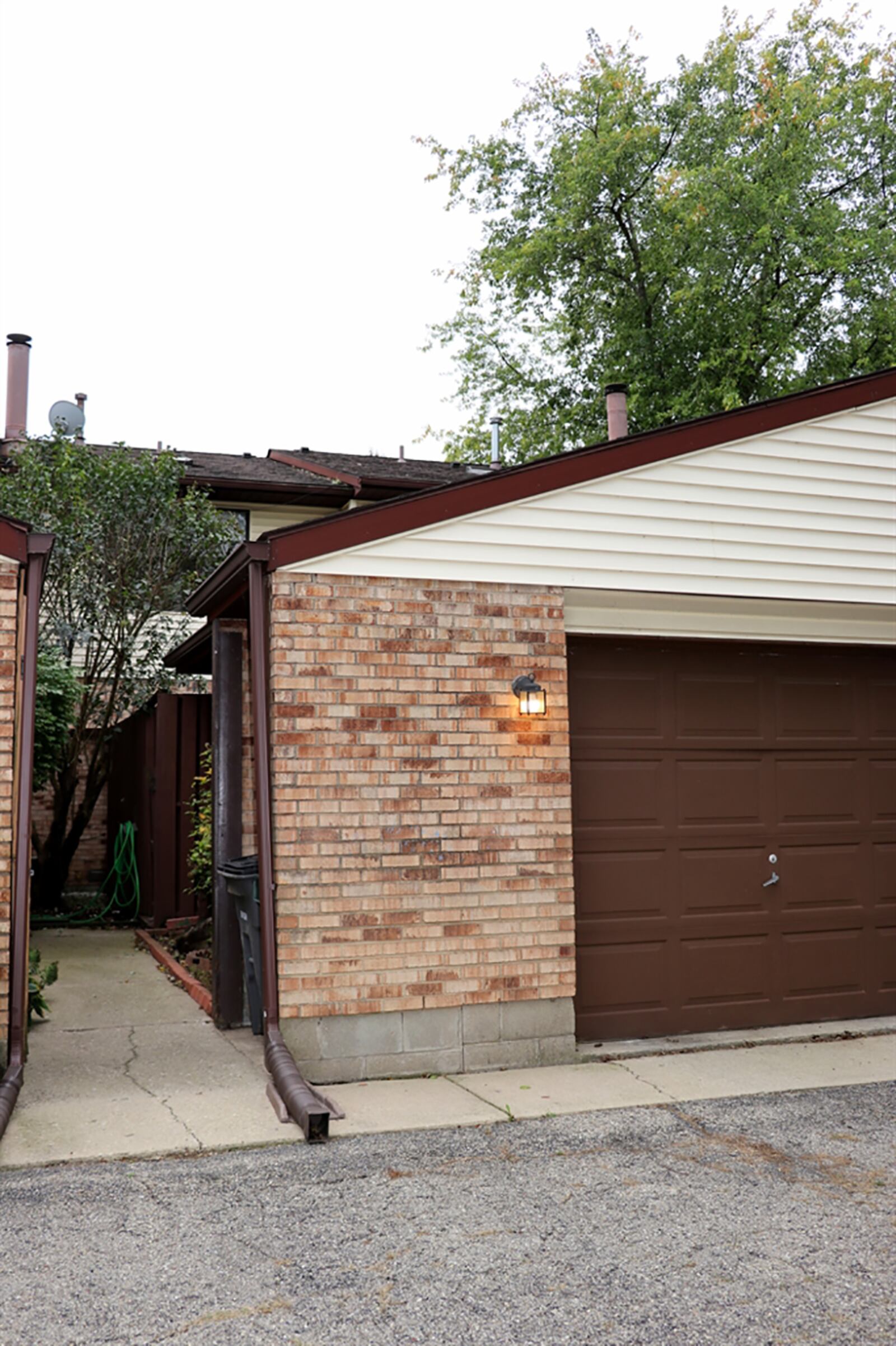 A detached, 1-car garage is accessible through a rear service door from the deck. CONTRIBUTED PHOTO BY KATHY TYLER