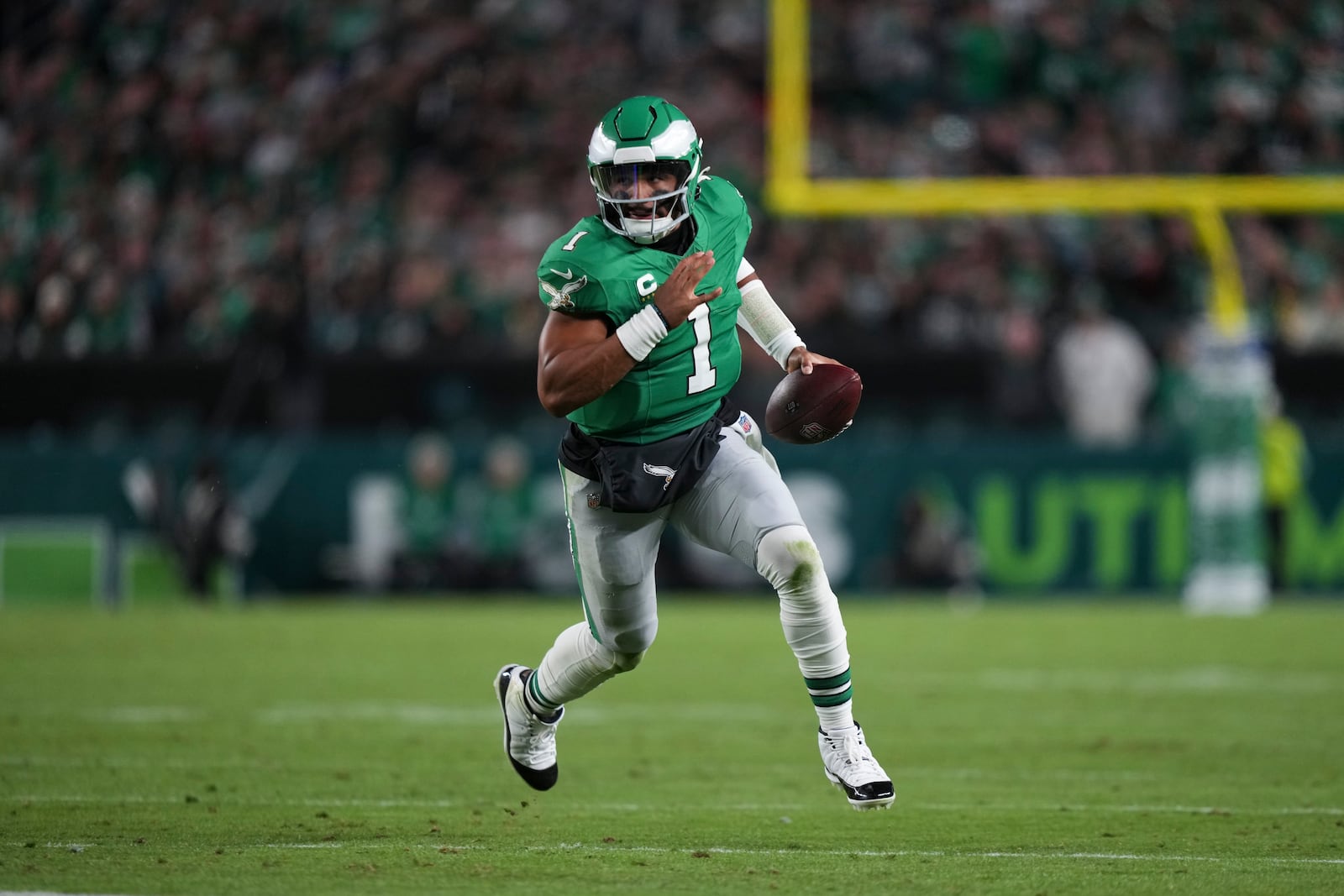 Philadelphia Eagles quarterback Jalen Hurts (1) runs with ball during the first half of an NFL football game against the Jacksonville Jaguars on Sunday, Nov. 3, 2024, in Philadelphia. (AP Photo/Matt Slocum)