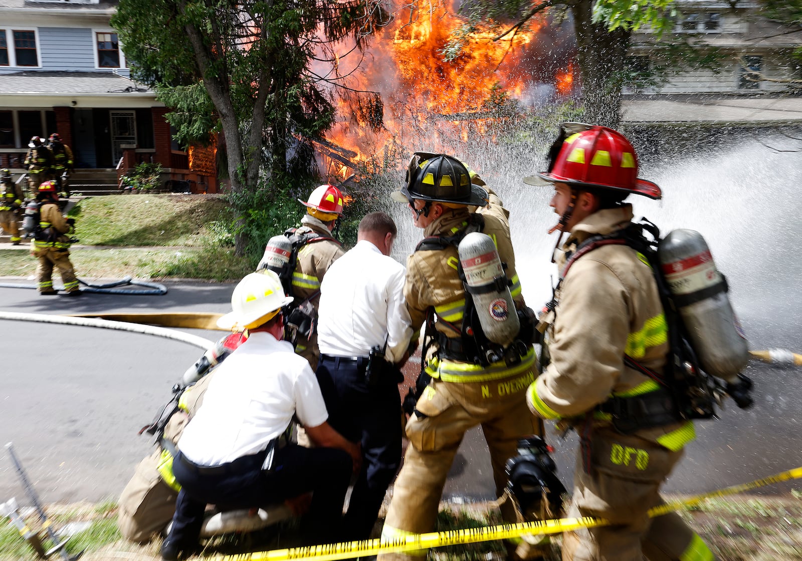 Three houses were destroyed by fire Tuesday, July 2, 2024, in the 100 block of Delaware Avenue. No one was home but a dog was rescued from one house and was given water and oxygen. MARSHALL GORBY\STAFF