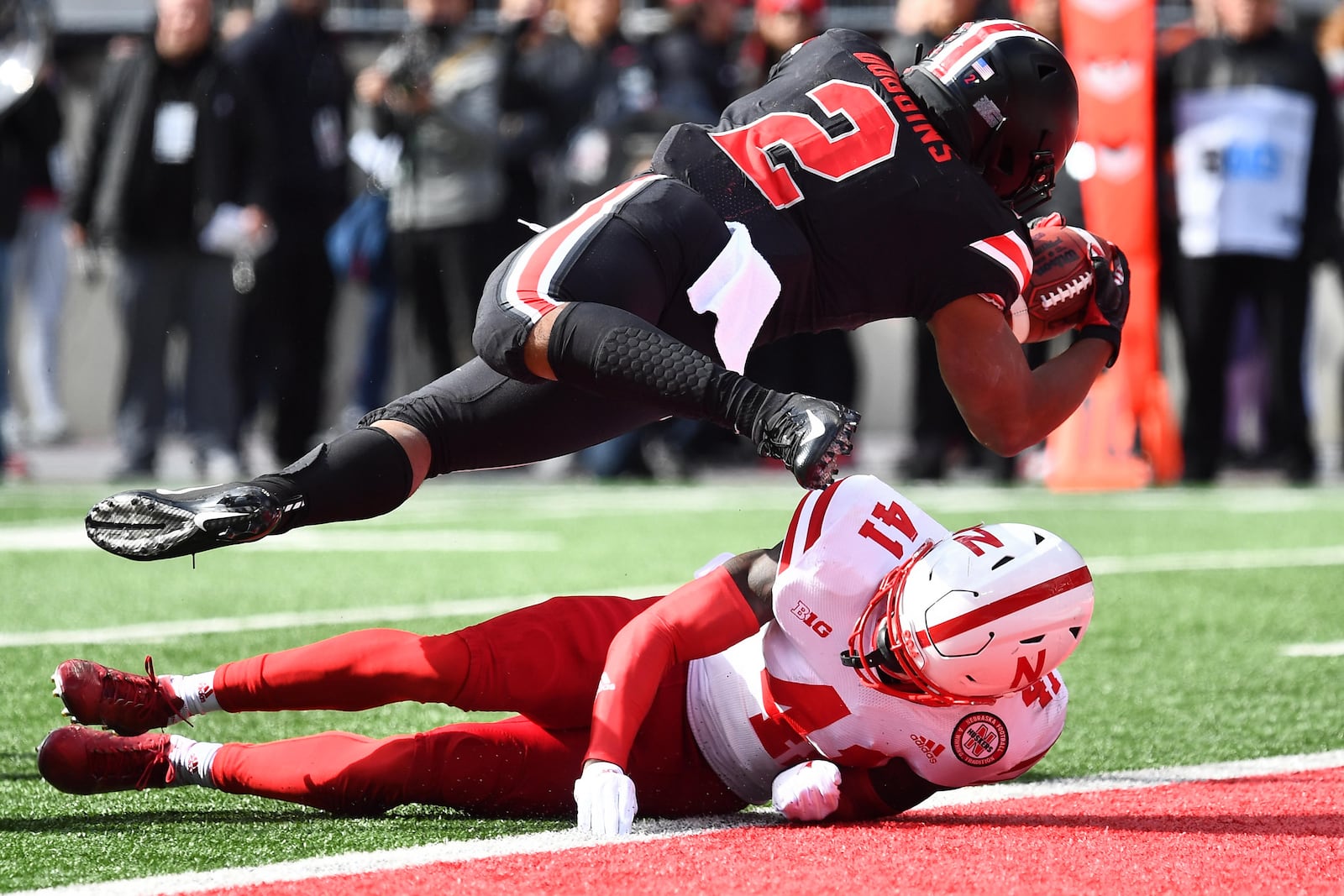 COLUMBUS, OH - NOVEMBER 3:  J.K. Dobbins #2 of the Ohio State Buckeyes scores a touchdown on a 10-yard run in the first quarter over the defense of Deontai Williams #41 of the Nebraska Cornhuskers at Ohio Stadium on November 3, 2018 in Columbus, Ohio.  (Photo by Jamie Sabau/Getty Images)