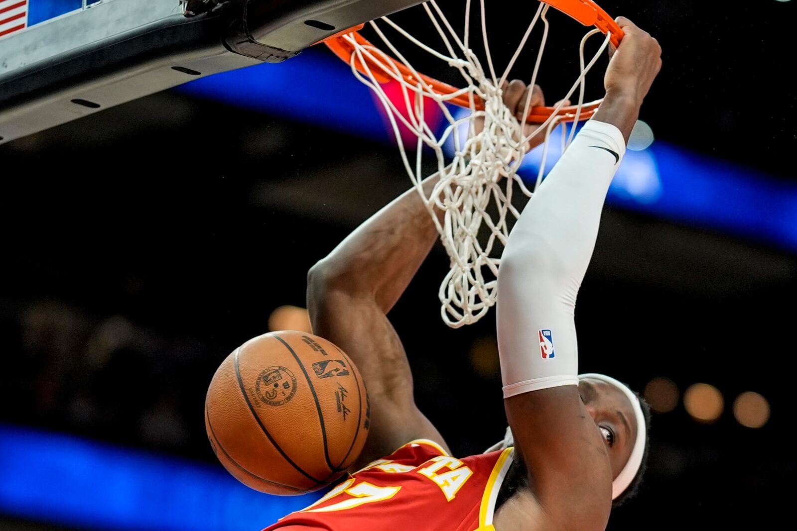 Atlanta Hawks forward Onyeka Okongwu (17) dunks against the San Antonio Spurs during the second half of an NBA basketball game, Wednesday, Feb. 5, 2025, in Atlanta. (AP Photo/Mike Stewart)