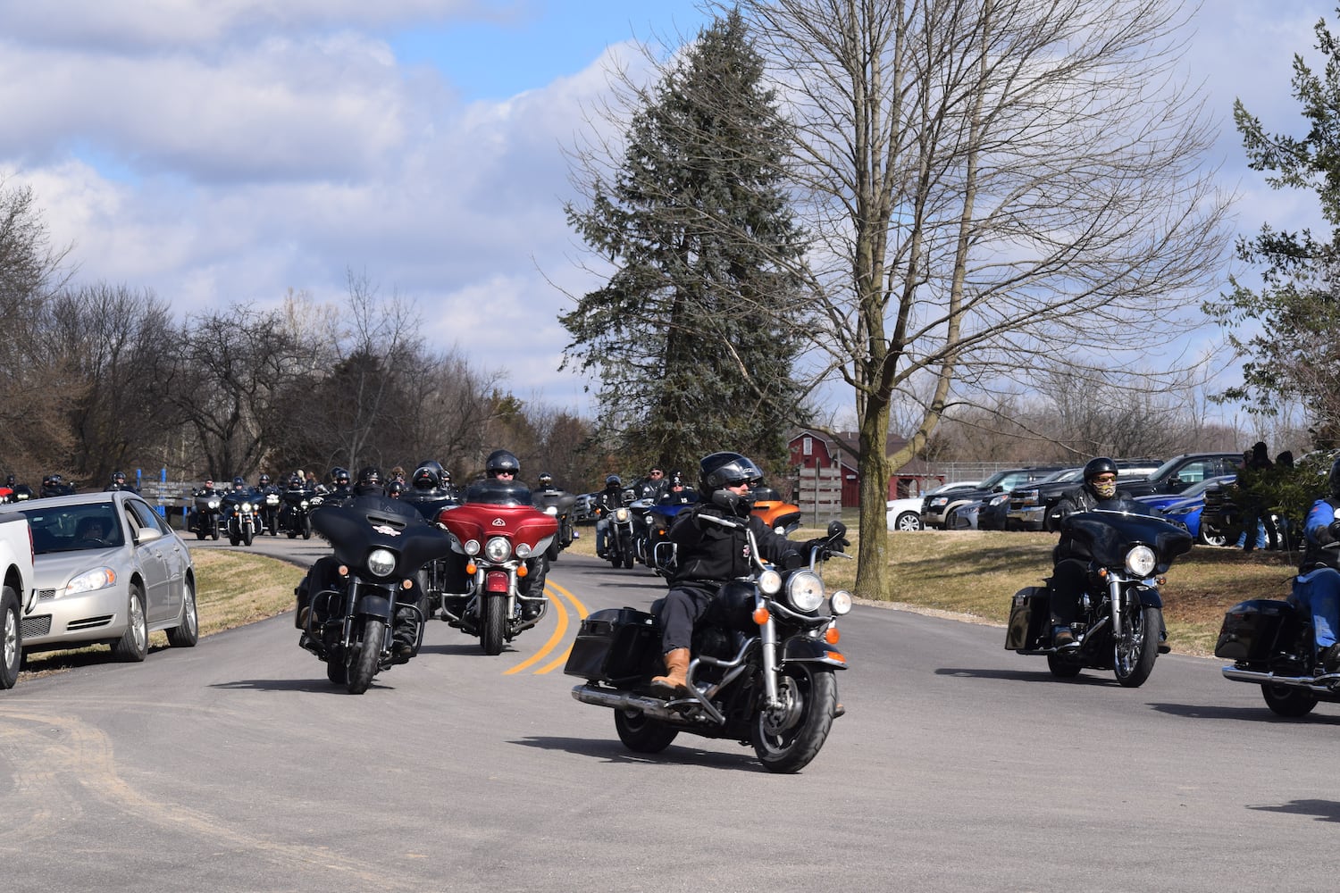 PHOTOS: Thousands of Outlaws attend motorcycle gang leaders funeral at Montgomery County Fairgrounds.