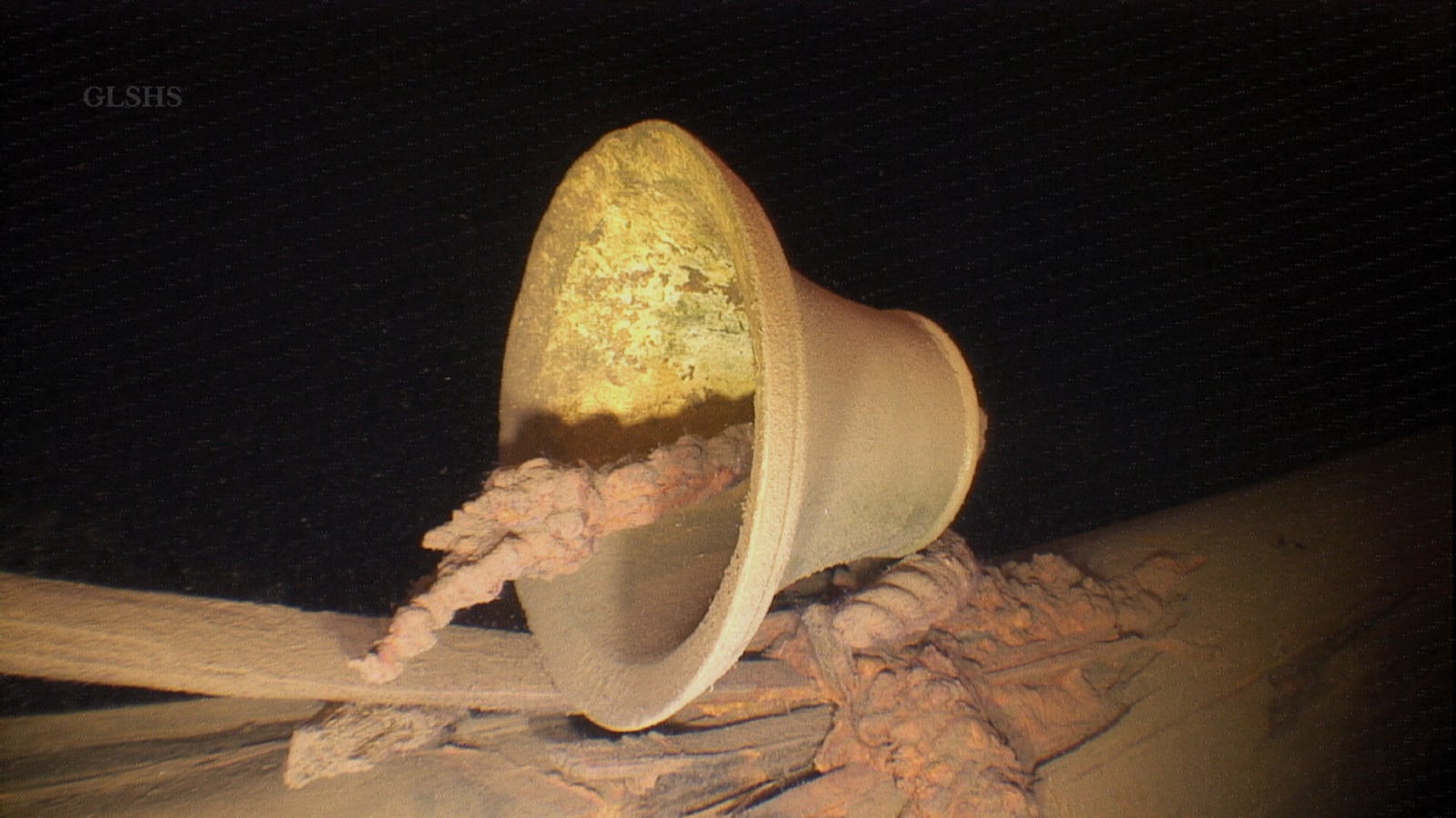 This image provided by Great Lakes Shipwreck Historical Society shows a the bell from The Western Reserve, a merchant ship that sank in Lake Superior in 1940 off Michigan’s Upper Peninsula. (Great Lakes Shipwreck Historical Society via AP)