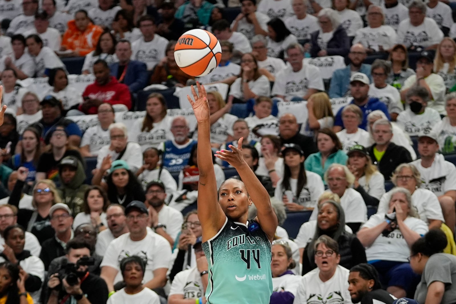 New York Liberty forward Betnijah Laney-Hamilton (44) shoots against the Minnesota Lynx during the first half of Game 4 of a WNBA basketball final playoff series, Friday, Oct. 18, 2024, in Minneapolis. (AP Photo/Abbie Parr)