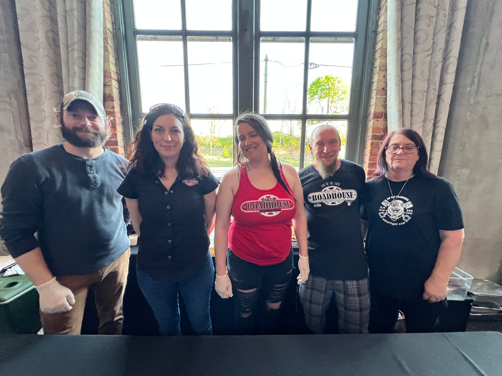 Rip Rap Roadhouse was awarded Best Pairing by attendees for their chicken and waffles. Here the staff poses in between serving hungry diners.