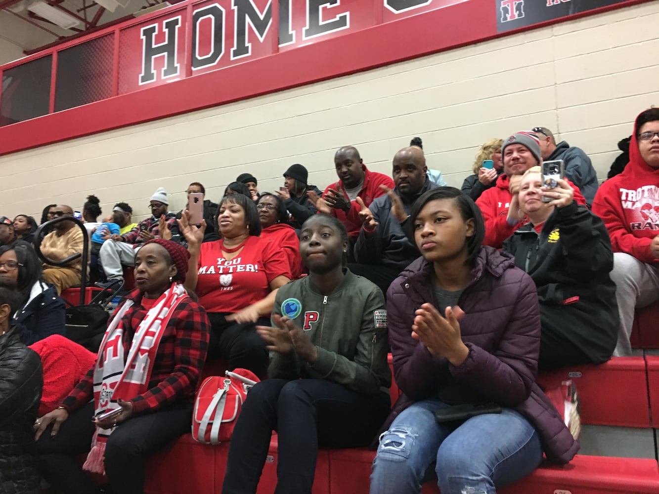 PHOTOS: Trotwood parents and fans welcome home football state champs at victory celebration