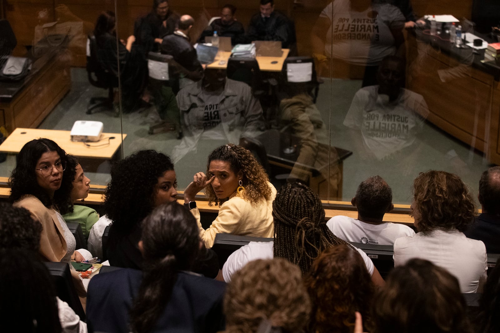 Brazil's Minister of Racial Equality Anielle Franco, center, sister of slain councilwoman Marielle Franco, attends the trial of Franco's suspected murderers, at the Court of Justice in Rio de Janeiro, Wednesday, Oct. 30, 2024. (AP Photo/Bruna Prado)